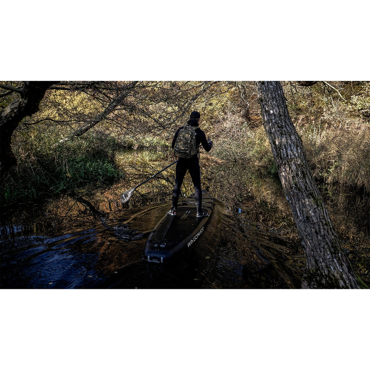 WINGOMART Elite 12′ XXL Inflatable Paddle Board — paddling a forest river